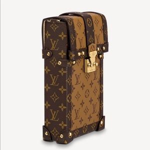 Louis Vuitton “VERTICAL TRUNK POCHETTE”